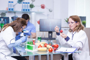treatment-study-genetically-engineered-strawberries-laboratory-by-group-scientist-test-tubes-with-green-solutions