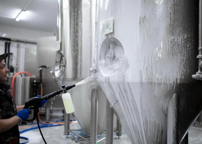 Industrial tank washing procedure highlighting CTC Volc cleaner uses
